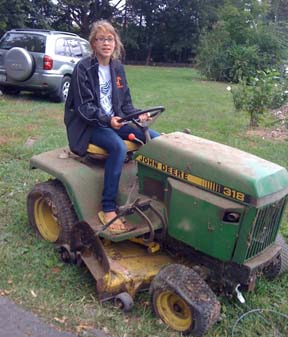 Young woman on tractor