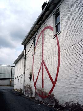 Peace symbol on side of building