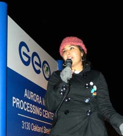 APC member Tania, speaking at immigration rally