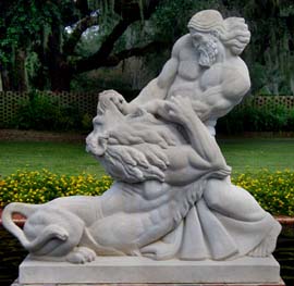 sculpture of man fighting lion